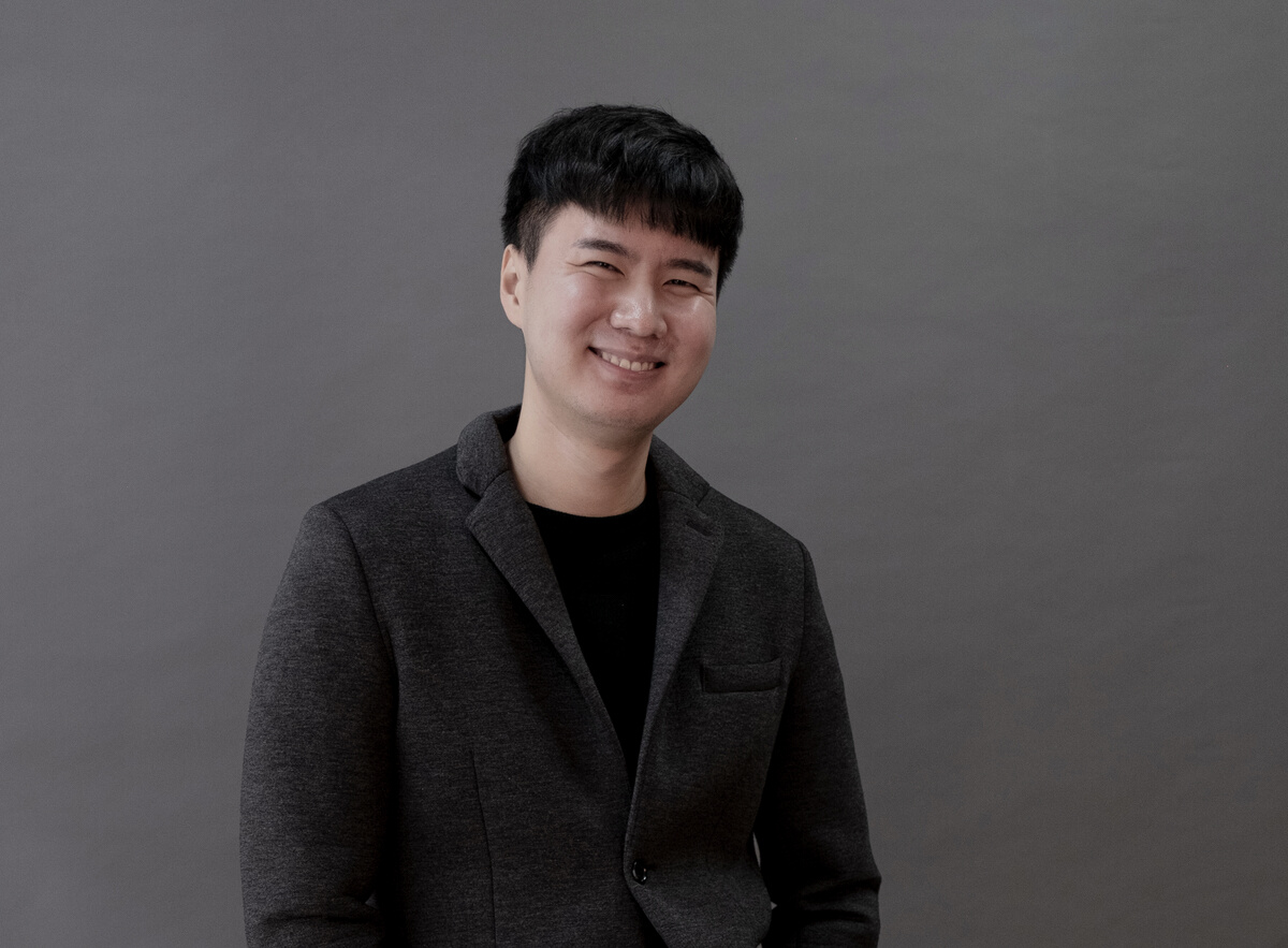 Portrait of Young Business Man in Business Suit